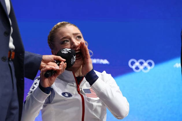 February 19, 2026, Milan, Lombardy, Italy: AMBER GLENN sits in the leader s position seat after skating her Women s Single Skating free program in the Figure skating, Eiskunstlauf at the Milano Cortina 2026 Winter Olympic Games, Olympische Spiele, Olympia, OS Olympics 2026: Milano Cortina: Figure Skating Women Single Skating  - ZUMAc179 20260219_oly_c179_134 Copyright: xMickaelxChavetx