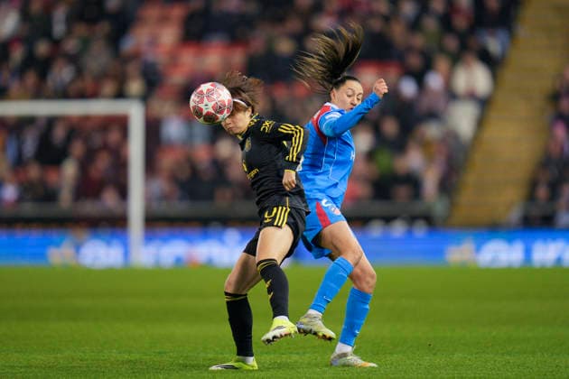 Manchester United, ManU Women v AtlÃ tico de Madrid Femenino, Leigh, UK - 19 {iptcmonthname3} 2026 Hinata Miyazawa of Manchester United Women competes for the ball with Fiamma of Athetico Madrid Femenino during the UEFA Women s Champions League, Knockout Round Play-Off Second Leg match between Manchester United Women and AtlÃ tico de Madrid Femenino at Leigh Sports Village, Leigh on 19 February 2026 ( Leigh Leigh Sports Village Greater Manchester England Copyright: xStevexFlynn PPAUKx PPA-249518