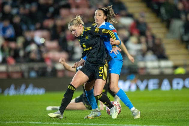 Manchester United, ManU Women v AtlÃ tico Madrid Femenino UEFA Womens Champions League Hanna Lundkvist of Manchester United Women holds off Fiamma Benitez of AtlÃ tico Madrid Femenino during the UEFA Womens Champions League Round of 16 Second Leg match between Manchester United Women and AtlÃ tico Madrid Femenino at Leigh Sports Village, Leigh 19 02 2026 UK Newspapers OUT Copyright: xMattxWilkinsonx FIL-23015-0018