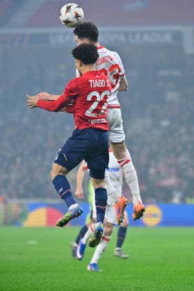 FOOTBALL : Lille vs Etoile Rouge Belgrade - Europa League - Lille - 19 02 2026 Tiago SANTOS ( 22 - Lille ) and Nayair Tiknizyan ( 23 - Red Star Belgrade ) during the UEFA Europa League match between Lille OSC and Red Star Belgrade at Stade Pierre Mauroy on February 19, 2026 in Lille, France. ( Photo by Federico Pestellini PsnewZ ) - LilleFrance  Copyright: xFedericoxPestellinix