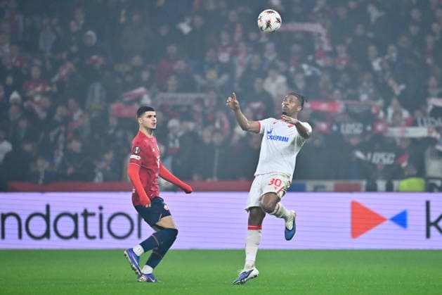 FOOTBALL : Lille vs Etoile Rouge Belgrade - Europa League - Lille - 19 02 2026 Franklin Tebo Uchenna ( 30 - Red Star Belgrade ) and Matias Fernandez Pardo ( 7 - Lille ) during the UEFA Europa League match between Lille OSC and Red Star Belgrade at Stade Pierre Mauroy on February 19, 2026 in Lille, France. ( Photo by Federico Pestellini PsnewZ ) - LilleFrance  Copyright: xFedericoxPestellinix