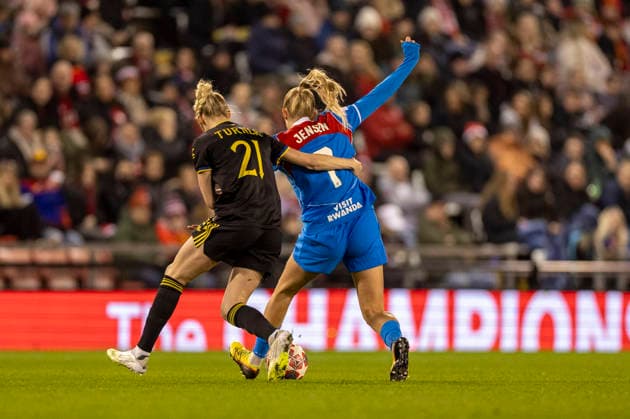 19th February 2026; Leigh Sports Village, Manchester, England; Womens Champions League Football, Manchester United, ManU versus Atletico Madrid; Synne Jensen of Atletico Madrid under pressure from Millie Turner of Manchester United Women  TimxWilliams Content restricted for UK based newspaper