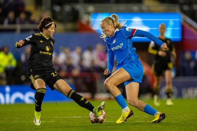 19th February 2026; Leigh Sports Village, Manchester, England; Womens Champions League Football, Manchester United, ManU versus Atletico Madrid; Synne Jensen of Atletico Madrid is tackled by Hinata Miyazawa of Manchester United Women  TimxWilliams Content restricted for UK based newspaper
