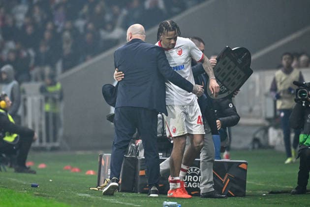 FOOTBALL : Lille vs Etoile Rouge Belgrade - Europa League - Lille - 19 02 2026 Jay Enem ( 42 - Red Star Belgrade ) shake hands with Dejan Stankovic ( coach Red Star Belgrade ) during the UEFA Europa League match between Lille OSC and Red Star Belgrade at Stade Pierre Mauroy on February 19, 2026 in Lille, France. ( Photo by Federico Pestellini PsnewZ ) - LilleFrance  Copyright: xFedericoxPestellinix