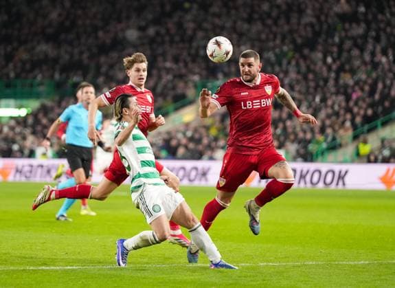 Daizen Maeda of Celtic & Jeff Chabot of Stuttgart Celtic v Stuttgart, UEFA Europa League, Knockout Round Play Offs, First Leg, Football, Celtic Park, Glasgow, Scotland, UK - 19 Feb 2026Glasgow Celtic Park Scotland United Kingdom EDITORIAL USE ONLY No use with unauthorised audio, video, data, fixture lists, club league logos or live services. Online in-match use limited to 120 images, no video emulation. No use in betting, games or single club league player publications. Copyright: xStuartxWallace Shutterstockx 16674319az