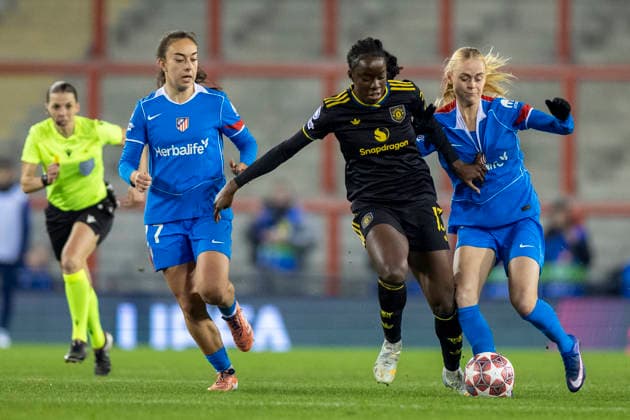 19th February 2026; Leigh Sports Village, Manchester, England; Womens Champions League Football, Manchester United, ManU versus Atletico Madrid; Ellen Wangerheim of Manchester United Women pulls the shirt of Kathrine Kuhl of Atletico Madrid  TimxWilliams Content restricted for UK based newspaper
