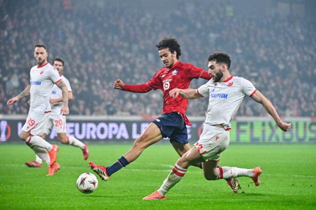FOOTBALL : Lille vs Etoile Rouge Belgrade - Europa League - Lille - 19 02 2026 Ayyoub BOUADDI ( 32 - Lille ) and Nayair Tiknizyan ( 23 - Red Star Belgrade ) during the UEFA Europa League match between Lille OSC and Red Star Belgrade at Stade Pierre Mauroy on February 19, 2026 in Lille, France. ( Photo by Federico Pestellini PsnewZ ) - LilleFrance  Copyright: xFedericoxPestellinix