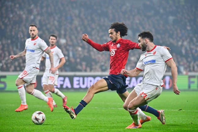 FOOTBALL : Lille vs Etoile Rouge Belgrade - Europa League - Lille - 19 02 2026 Ayyoub BOUADDI ( 32 - Lille ) and Nayair Tiknizyan ( 23 - Red Star Belgrade ) during the UEFA Europa League match between Lille OSC and Red Star Belgrade at Stade Pierre Mauroy on February 19, 2026 in Lille, France. ( Photo by Federico Pestellini PsnewZ ) - LilleFrance  Copyright: xFedericoxPestellinix