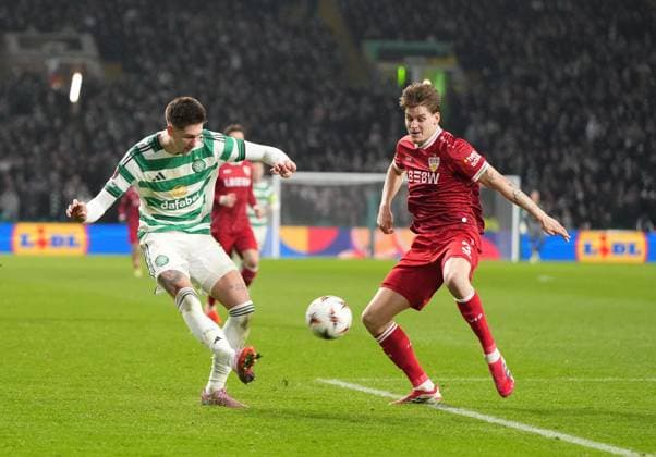 Tomas Cvancara of Celtic crosses the ball beyond Ramon Hendriks of Stuttgart. Celtic v Stuttgart, UEFA Europa League, Knockout Round Play Offs, First Leg, Football, Celtic Park, Glasgow, Scotland, UK - 19 Feb 2026Glasgow Celtic Park Scotland United Kingdom EDITORIAL USE ONLY No use with unauthorised audio, video, data, fixture lists, club league logos or live services. Online in-match use limited to 120 images, no video emulation. No use in betting, games or single club league player publications. Copyright: xStuartxWallace Shutterstockx 16674319bs