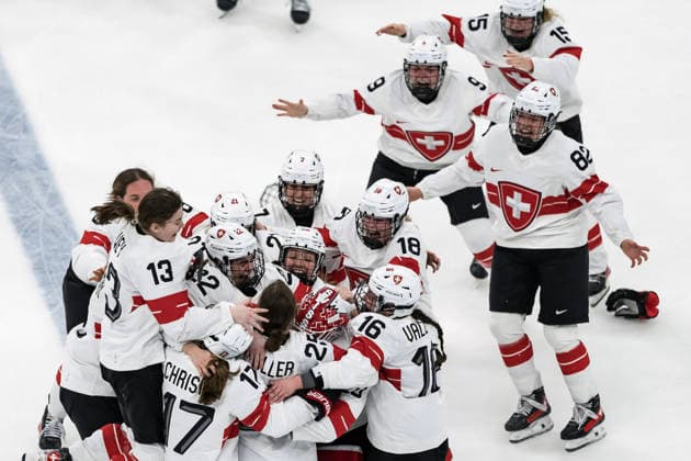 February 19, 2026, Milan, Lombardy, Italy: Team Switzerland celebrates after winning against Team Sweden, 2:1 in overtime in the Women s Bronze Medal Game at the Milano Rho Ice hockey, Eishockey Arena in MILAN, Italy during the 2026 Milano Cortina Winter Olympics. Olympics 2026: Milano Cortina: Ice Hockey Womens: Bronze Medal Game: SUI 2:1 SWE  - ZUMAa161 20260219_oly_a161_935 Copyright: xWalterxG.xArcex