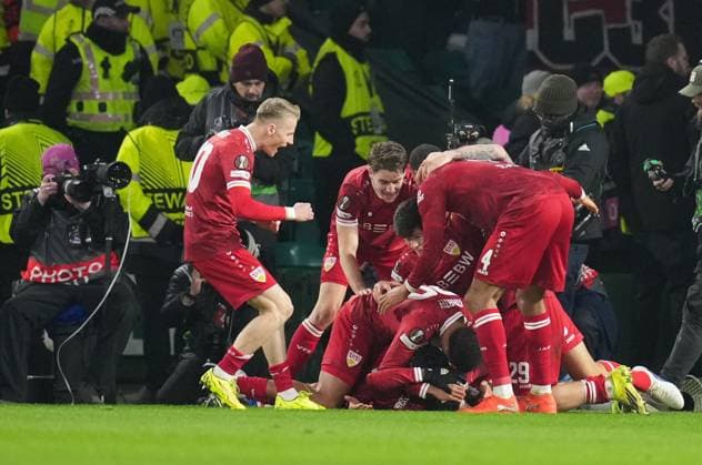 Tiago Tomas of Stuttgart is mobbed by team mates as he celebrates scoring to give Stuttgart a 1-3 lead. Celtic v Stuttgart, UEFA Europa League, Knockout Round Play Offs, First Leg, Football, Celtic Park, Glasgow, Scotland, UK - 19 Feb 2026Glasgow Celtic Park Scotland United Kingdom EDITORIAL USE ONLY No use with unauthorised audio, video, data, fixture lists, club league logos or live services. Online in-match use limited to 120 images, no video emulation. No use in betting, games or single club league player publications. Copyright: xStuartxWallace Shutterstockx 16674319cg