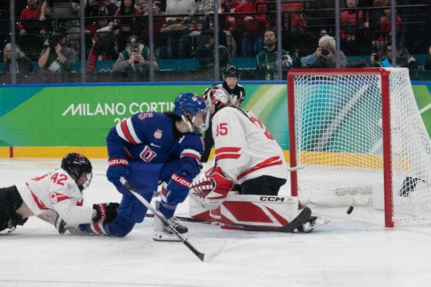 February 19, 2026, Milan, Lombardy, Italy: MEGAN HELLER (5) Team USA scores the overtime goal in the Team Canada vs. Team USA in Women s Ice hockey, Eishockey Gold Medal Match at the Milano Santagiulia Ice Hockey during the 2026 Milano Cortina Winter Olympics. USA won in overtime 2-1. Olympics 2026: Milano Cortina: Ice Hockey Womens: Gold Medal Game: USA 2:1 CAN  - ZUMAa19_ 20260219_oly_a19_002 Copyright: xAngelxAdamsx