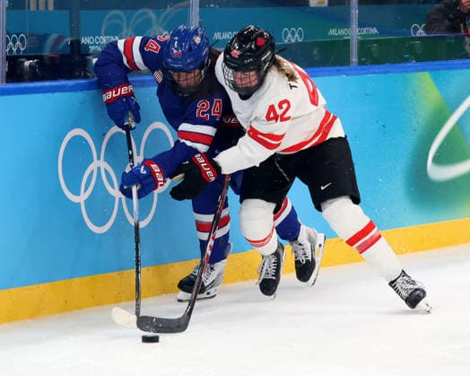 February 19, 2026, Milan, Lombardy, Italy: Joy Dunne 24 of Team United States and Claire Thompson 42 of Team Canada in the women s Ice hockey, Eishockey gold medal game during the Milano Cortina 2026 Olympic Winter games, Winterspiele,Spiele, Summer games at Milano Santagiulia Ice Hockey Arena. Olympics 2026: Milano Cortina: Ice Hockey-Women Finals - Gold Medal Game-USA V CAN  - ZUMAm117 20260219_oly_m117_090 Copyright: xDavidxMcIntyrex