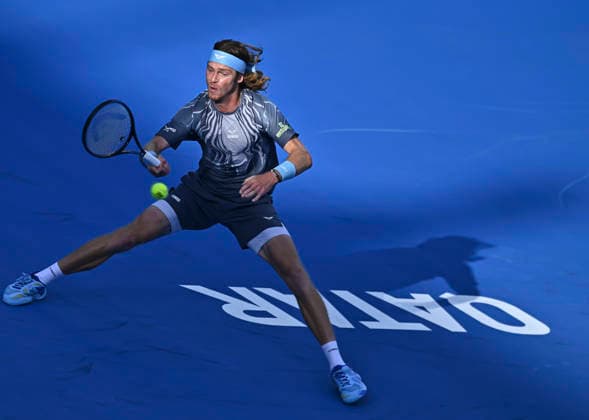 February 19, 2026, Doha, Qatar: Andrey Rublev of Russia plays against Stefanos Tsitsipas of Greece (not in view) during their men s singles quarter final match at the ATP, Tennis Herren Qatar Exxonmobil Open 2026 tennis tournament at the Khalifa International Tennis Complex. Andrey Rublev won against Andrey Rublev 6-3,7-6. Doha Qatar - ZUMAs197 20260219_aaa_s197_178 Copyright: xNoushadxVariyattiyakkalx