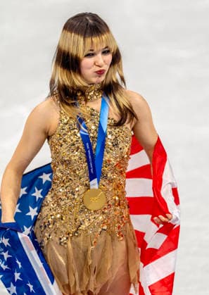 February 19, 2026, Milan, Lombardy, Italy: American ALYSA LIU and her gold medal and flag after the Women Single Skating- Free Skating medal round Thursday night at this Milano Cortina 2026 Olympics. Olympics 2026: Milano Cortina: Figure skating, Eiskunstlauf Women s  - ZUMAa35_ 20260219_oly_a35_022 Copyright: xDanielxA.xAndersonx