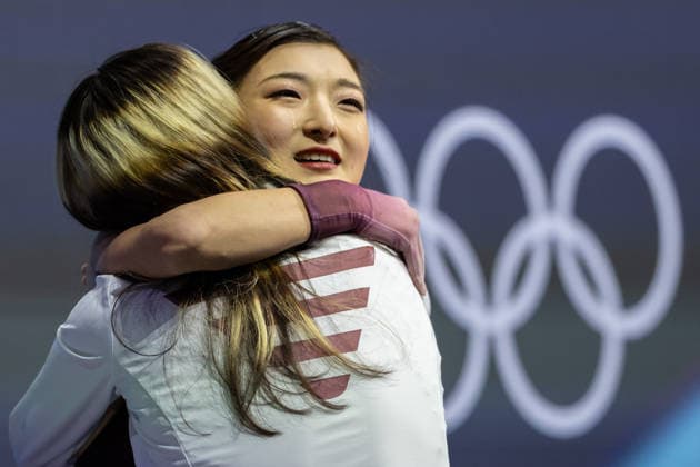 February 19, 2026, Milano, Lombardy, Italy: Kaori Sakamoto of Japan hugs Alysa Liu of the United States after her performance during the Figure skating, Eiskunstlauf Women Single during the 2026 Winter Olympics at the Milano Ice Skating Arena on Thursday in Milano. Kaori Sakamoto won the silver medal and Alysa Liuwon the gold medal. Milano Italy - ZUMAj89_ 20260219_oly_j89_145 Copyright: xPaulxKitagakixJr.x