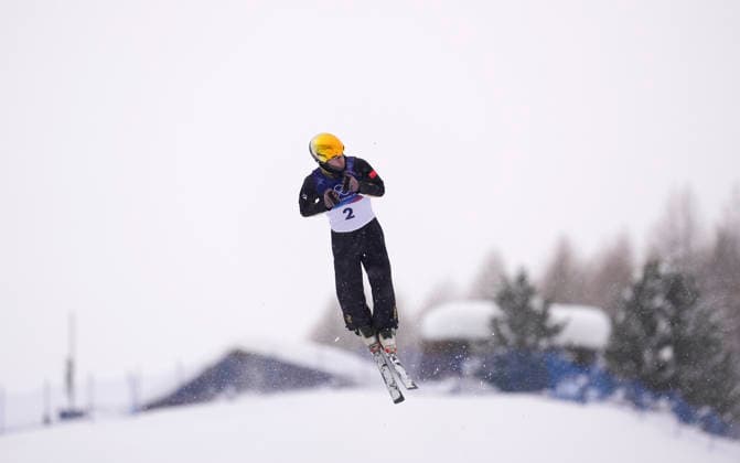 (260220) -- LIVIGNO, Feb. 20, 2026 -- Li Tianma of China competes during the freestyle skiing men s aerials qualification 1 at the Milan-Cortina 2026 Olympic Winter games, Winterspiele,Spiele, Summer games in Livigno, Italy, Feb. 20, 2026. ) (MICO2026)ITALY-LIVIGNO-OLYMPIC WINTER GAMES-FREESTYLE SKIING-MEN S AERIALS-QUALIFICATION HuxChao 