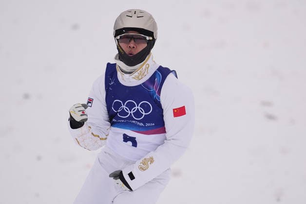 (260220) -- LIVIGNO, Feb. 20, 2026 -- Wang Xindi of China reacts during the freestyle skiing men s aerials qualification 1 at the Milan-Cortina 2026 Olympic Winter games, Winterspiele,Spiele, Summer games in Livigno, Italy, Feb. 20, 2026. ) (MICO2026)ITALY-LIVIGNO-OLYMPIC WINTER GAMES-FREESTYLE SKIING-MEN S AERIALS-QUALIFICATION HuxChao 