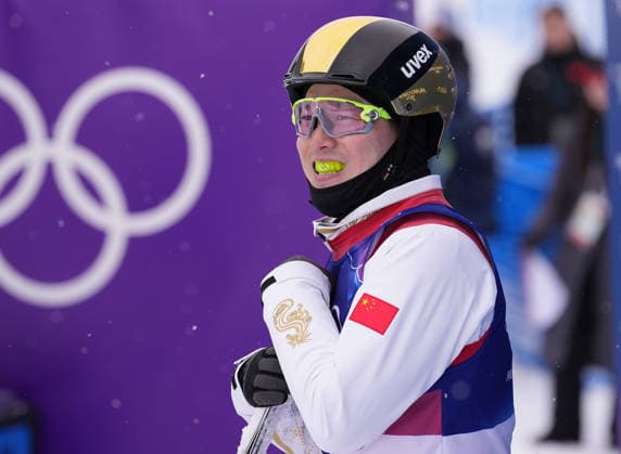 (260220) -- LIVIGNO, Feb. 20, 2026 -- Qi Guangpu of China reacts during the freestyle skiing men s aerials qualification 1 at the Milan-Cortina 2026 Olympic Winter games, Winterspiele,Spiele, Summer games in Livigno, Italy, Feb. 20, 2026. ) (MICO2026)ITALY-LIVIGNO-OLYMPIC WINTER GAMES-FREESTYLE SKIING-MEN S AERIALS-QUALIFICATION HuxChao 