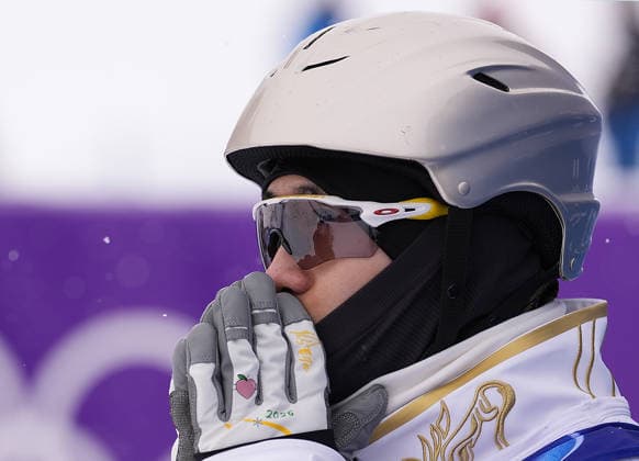 (260220) -- LIVIGNO, Feb. 20, 2026 -- Wang Xindi of China reacts during the freestyle skiing men s aerials qualification 1 at the Milan-Cortina 2026 Olympic Winter games, Winterspiele,Spiele, Summer games in Livigno, Italy, Feb. 20, 2026. ) (MICO2026)ITALY-LIVIGNO-OLYMPIC WINTER GAMES-FREESTYLE SKIING-MEN S AERIALS-QUALIFICATION HuxChao 
