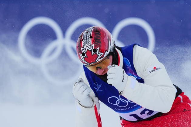 February 20, 2026, Livigno, Italy: Canada s Lewis Irving reacts to his run during the men s aerials final at the Milano Cortina 2026 Winter Olympic Games, Olympische Spiele, Olympia, OS in Livigno, Italy, Friday, Feb. 20, 2026. Canada News - February 20, 2026  - ZUMAc35_ 20260220_zaf_c35_026 Copyright: xSeanxKilpatrickx