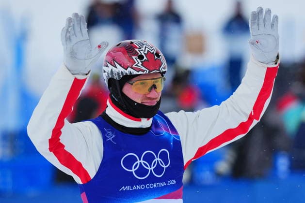 February 20, 2026, Livigno, Italy: Canada s Lewis Irving reacts to his run during the men s aerials final at the Milano Cortina 2026 Winter Olympic Games, Olympische Spiele, Olympia, OS in Livigno, Italy, Friday, Feb. 20, 2026. Canada News - February 20, 2026  - ZUMAc35_ 20260220_zaf_c35_025 Copyright: xSeanxKilpatrickx