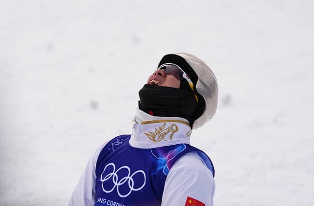 (260220) -- LIVIGNO, Feb. 20, 2026 -- Gold medalist Wang Xindi of China celebrates winning after the freestyle skiing men s aerials final 2 at the Milan-Cortina 2026 Olympic Winter games, Winterspiele,Spiele, Summer games in Livigno, Italy, Feb. 20, 2026. ) (MICO2026)ITALY-LIVIGNO-OLYMPIC WINTER GAMES-FREESTYLE SKIING-MEN S AERIALS-FINAL WuxHuiwo 
