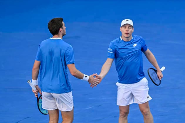 ATP, Tennis Herren Qatar ExxonMobil Open-Doubles Final Harri Heliovaara (R) of Finland and Henry Patten of Great Britain competes against Julian Cash and Lloyd Glasspool of Great Britain in the Doubles Final match at the ATP men s Qatar ExxonMobil Open 2026 tennis tournament at the Khalifa International Tennis Complex in Doha, Qatar, on February 20, 2026. DOHA Qatar Copyright: xNOUSHADx