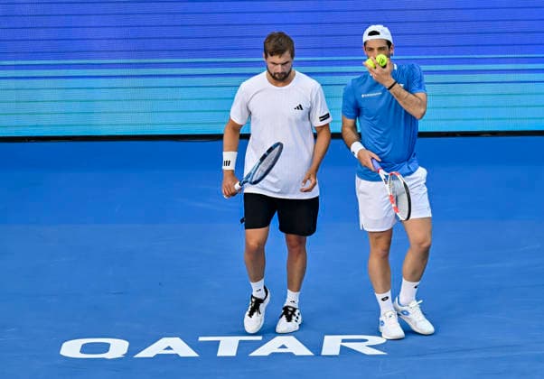 ATP, Tennis Herren Qatar ExxonMobil Open-Doubles Final Julian Cash (R) and Lloyd Glasspool of Great Britain competes against Harri Heliovaara of Finland and Henry Patten of Great Britain in the Doubles Final match at the ATP men s Qatar ExxonMobil Open 2026 tennis tournament at the Khalifa International Tennis Complex in Doha, Qatar, on February 20, 2026. DOHA Qatar Copyright: xNOUSHADx