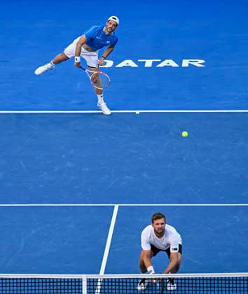 ATP, Tennis Herren Qatar ExxonMobil Open-Doubles Final Julian Cash (top) and Lloyd Glasspool of Great Britain competes against Harri Heliovaara of Finland and Henry Patten of Great Britain in the Doubles Final match at the ATP men s Qatar ExxonMobil Open 2026 tennis tournament at the Khalifa International Tennis Complex in Doha, Qatar, on February 20, 2026. DOHA Qatar Copyright: xNOUSHADx