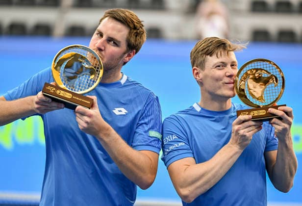 ATP, Tennis Herren Qatar ExxonMobil Open-Doubles Final Harri Heliovaara of Finland and Henry Patten of Great Britain pose with their trophies after winning their menÕs Doubles Final match against Julian Cash and Lloyd Glasspool of Great Britain during the ATP Qatar ExxonMobil Open 2026 tennis tournament at the Khalifa International Tennis Complex in Doha, Qatar, on February 20, 2026. DOHA Qatar Copyright: xNOUSHADx