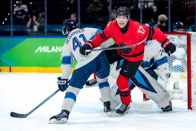 OLYMPICS - Winter Olympic Games, Olympische Spiele, Olympia, OS Milano Cortina 2026 MILAN,ITALY,20.FEB.26 - OLYMPICS, Ice hockey, Eishockey - Winter Olympic Games Milano Cortina 2026, semifinal, Canada vs Finland, men. Image shows Miro Heiskanen (FIN), Macklin Celebrini (CAN) and Juuse Saros (FIN).  GEPAxpictures xMatthiasxTrinkl