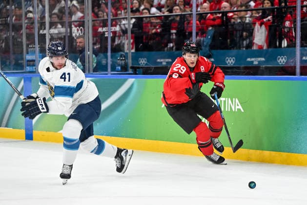 MILAN, ITALY - FEBRUARY 20: Nathan MacKinnon of Canada R) skates by Miro Heiskanen of Finland L) during the Ice hockey, Eishockey Men™s Play-offs Semifinals match between Canada and Finland on day fourteen of the Milano Cortina 2026 Winter Olympic Games, Olympische Spiele, Olympia, OS at Milano Santagiulia Ice Hockey Arena on February 20, 2026 in Milan, Italy. Milan Milano Santagiulia Ice Hockey Arena Italy *** MILAN, ITALY FEBRUARY 20 Nathan MacKinnon of Canada R skates by Miro Heiskanen of Finland L during the Ice Hockey Men™s Play offs Semifinals match between Canada and Finland on day fourteen of the Milano Cortina 2026 Winter Olympic games at Milano Santagiulia Ice Hockey Arena on February 20, 2026 in Milan, Italy Milan Milano Santagiulia Ice Hockey Arena Italy Copyright: xJustPictures.ch AndreaxBrancax jp-en-EuSpIm-AB-AAB_328620022026