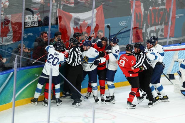 February 20, 2026, Milan, Lombardy, Italy: A fight breaks out during the Semifinal game between Team Canada (CAN) and Team Finland (FIN) at the Milano Cortina 2026 Olympic Games, Olympische Spiele, Olympia, OS Olympics 2026: Milano Cortina: Ice hockey, Eishockey Men: CAN:FIN  - ZUMAc179 20260220_oly_c179_003 Copyright: xMickaelxChavetx