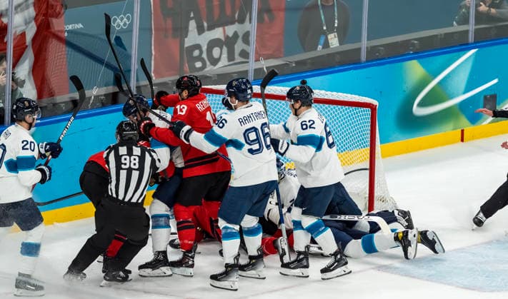 February 20, 2026, Milan, Lombardy, Italy: Team Canada fights against Team Finland during the 1st period in the Mens Play-offs Semifinal game at the Milano Santagiulia Ice hockey, Eishockey Arena in MILAN, Italy during the 2026 Milano Cortina Winter Olympics. Olympics 2026: Milano Cortina: Ice Hockey Mens: Team Canada Vs Team Finland Play-Offs Semifinals  - ZUMAa161 20260220_oly_a161_005 Copyright: xWalterxG.xArcex