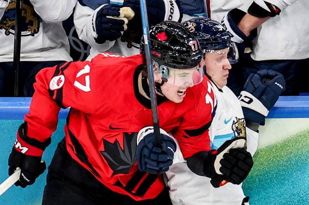 ITALY, MILAN - FEBRUARY 20, 2026: Canada s Macklin Celebrini (L) and Finland s Joel Kiviranta are in action in a menâ€™s Ice hockey, Eishockey play-off semifinal match at the Milano Santagiulia Ice Hockey Arena, as part of the 2026 Winter Olympic Games, Olympische Spiele, Olympia, OS Peter Kovalev TASS  89000254