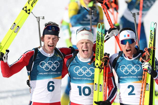 (260220) -- ANTERSELVA, Feb. 20, 2026 -- Gold medalist Johannes Dale-Skjevdal (C) of Norway, silver medalist Sturla Holm Laegreid (L) of Norway, and bronze medalist Quentin Fillon Maillet of France celebrate after the biathlon men s 15km mass start event at the 2026 Milan-Cortina Winter Olympics in Anterselva, Italy, Feb. 20, 2026. ) (MICO2026)ITALY-ANTERSELVA-OLYMPIC Winter games, Winterspiele,Spiele, Summer games BIATHLON-MEN S 15KM MASS START ZhangxTao 
