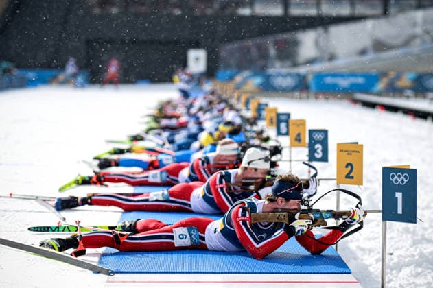 (260220) -- ANTERSELVA, Feb. 20, 2026 -- Sturla Holm Laegreid (front) of Norway competes during the biathlon men s 15km mass start event at the 2026 Milan-Cortina Winter Olympics in Anterselva, Italy, Feb. 20, 2026. ) (MICO2026)ITALY-ANTERSELVA-OLYMPIC Winter games, Winterspiele,Spiele, Summer games BIATHLON-MEN S 15KM MASS START JiangxHan 