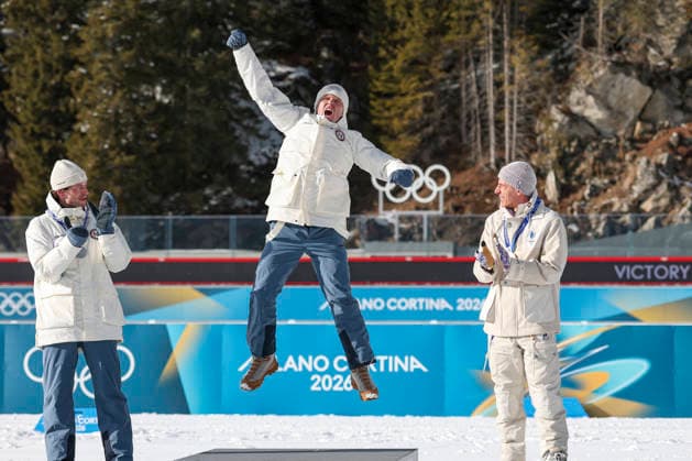 (260220) -- ANTERSELVA, Feb. 20, 2026 -- Gold medalist Johannes Dale-Skjevdal (C) of Norway celebrates during the awarding ceremony of the biathlon men s 15km mass start event at the 2026 Milan-Cortina Winter Olympics in Anterselva, Italy, Feb. 20, 2026. ) (MICO2026)ITALY-ANTERSELVA-OLYMPIC Winter games, Winterspiele,Spiele, Summer games BIATHLON-MEN S 15KM MASS START ZhangxTao 