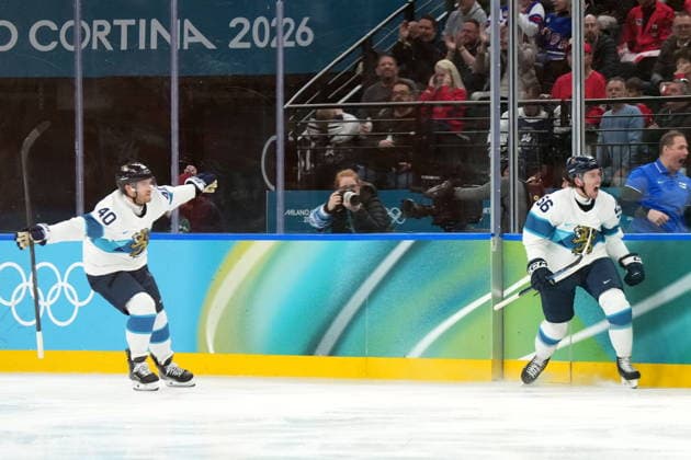 February 20, 2026, Milan, ITALY: Finland forward Erik Haula (56) celebrates his short handed goal with teammate Joel Armia (40) during second period Men s Olympic semifinal Ice hockey, Eishockey action against Canada, at the 2026 Milan Cortina Winter Olympics in Milan, Friday, Feb. 20, 2026. Canada News - February 20, 2026  - ZUMAc35_ 20260220_zaf_c35_049 Copyright: xNathanxDenettex