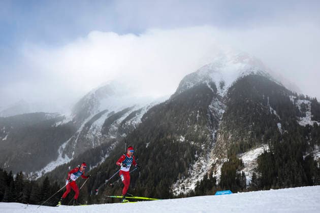 (260220) -- ANTERSELVA, Feb. 20, 2026 -- Joscha Burkhalter (R) of Switzerland competes during the biathlon men s 15km mass start event at the 2026 Milan-Cortina Winter Olympics in Anterselva, Italy, Feb. 20, 2026. ) (MICO2026)ITALY-ANTERSELVA-OLYMPIC Winter games, Winterspiele,Spiele, Summer games BIATHLON-MEN S 15KM MASS START ZhangxTao 