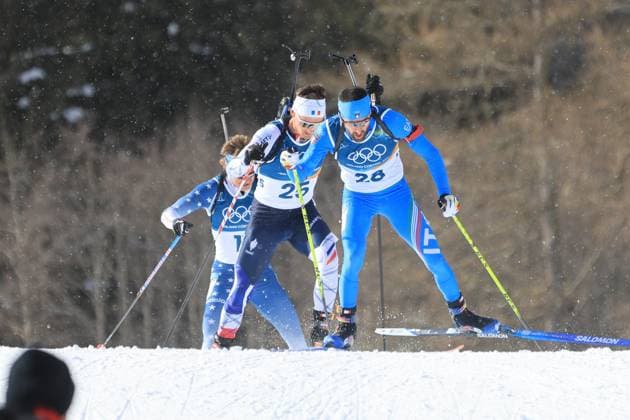 Jeux Olympiques d hiver Milan Cortina PHOTOPQR LE COURRIER PICARD Haslin ; Anterselva ; 20 02 2026 ; 20 02 26 Jeux Olympiques d hiver Milan Cortina - Winter Olympics games Milano Cortina Biathlon mass start hommes Nicola Romanin (Ita) - Fabien Claude (Fra) et Campbell Wright (Usa) Photo Fred Haslin *** Local Caption *** Anterselva Sud Tyrol France  Copyright: xPHOTOPQR LExCOURRIERxPICARD MAXPxHaslinx 20260220LCP4437 20260220LCP4437