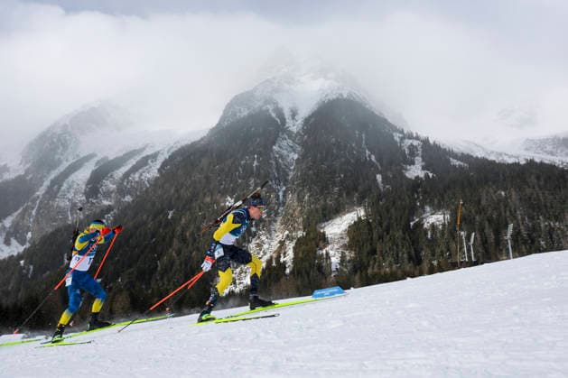 (260220) -- ANTERSELVA, Feb. 20, 2026 -- Martin Ponsiluoma (R) of Sweden competes during the biathlon men s 15km mass start event at the 2026 Milan-Cortina Winter Olympics in Anterselva, Italy, Feb. 20, 2026. ) (MICO2026)ITALY-ANTERSELVA-OLYMPIC Winter games, Winterspiele,Spiele, Summer games BIATHLON-MEN S 15KM MASS START ZhangxTao 
