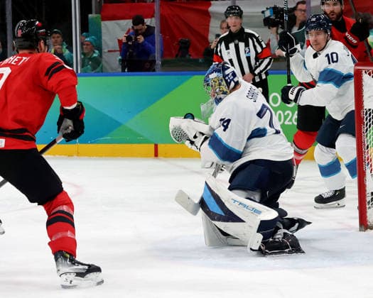 February 20, 2026, Milan, Lombardy, Italy: Juuse Saros (74) of Team Finland stops a shot against Team Canada in a men s Ice hockey, Eishockey semifinal during the Milano Cortina 2026 Olympic Winter games, Winterspiele,Spiele, Summer games at Milano Santagiulia Ice Hockey Arena Olympics 2026: Milano Cortina: Ice Hockey-Men Semifinal- CAN-FIN  - ZUMAm117 20260220_oly_m117_013 Copyright: xDavidxMcIntyrex