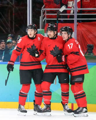 February 20, 2026, Milan, Lombardy, Italy: Sam Reinhart (13) of Team Canada after goal against Team Finland with Nathan MacKinnon (29) of Team Canada and Macklin Celebrini (17) of Team Canada in a men s Ice hockey, Eishockey semifinal during the Milano Cortina 2026 Olympic Winter games, Winterspiele,Spiele, Summer games at Milano Santagiulia Ice Hockey Arena Milan Italy - ZUMAm117 20260220_oly_m117_024 Copyright: xDavidxMcIntyrex