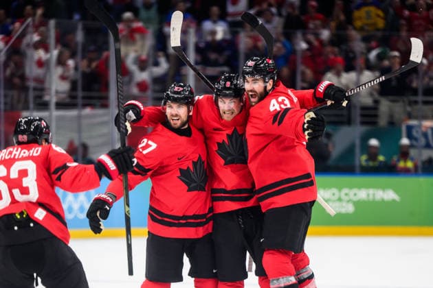260220 Shea Theodore, Travis Sanheim and Tom Wilson of Canada celebrate the 2-2 goal in the men s Ice hockey, Eishockey semifinal between Canada and Finland during day 14 of the 2026 Winter Olympics on February 20, 2026 in Milan. Photo: Carl Sandin BILDBYRAN kod CS CS0887 ishockey ice hockey Olympic Games, Olympische Spiele, Olympia, OS olympics winter olympics os ol olympiska spel vinter-os olympiske leker milano cortina 2026 milan cortina 2026 milano cortina 2026 olympic games milano cortina 2026 winter olympic games milano cortina-os milano cortina-ol vinter-ol 14 bbeng finland canada kanada jubel *** 260220 Shea Theodore, Travis Sanheim and Tom Wilson of Canada celebrate the 2 2 goal in the men s ice hockey semifinal between Canada and Finland during day 14 of the 2026 Winter Olympics on February 20, 2026 in Milan Photo Carl Sandin BILDBYRAN kod CS CS0887 ishockey ice hockey olympic games olympics winter olympics os ol olympiska spel vinter os olympiske leker milano cortina 2026 milan cortina 2026 milano cortina 2026 olympic games milano cortina 2026 winter olympic games milano cortina os milano cortina ol vinter ol 14 bbeng finland canada kanada jubel  Copyright: CARLxSANDIN BB260220CS036