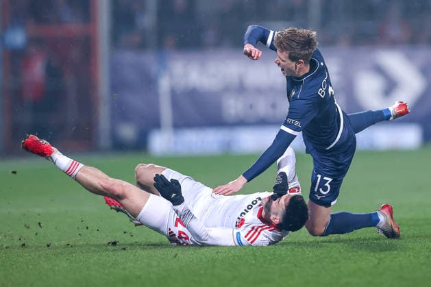 20 02 2026, Football, VfL Bochum 1 FC Nürnberg, 2 Fußball Bundesliga, 23 Matchday, Vonovia Ruhrstadion, Season 2025 2026 Luka Lochoshvili 1FC Nuernberg 24 in duel against Oliver Olsen VfL Bochum 13 DFB regulations prohibit any use of photographs as image sequences and or quasi video Nordrhein Westfalen Germany