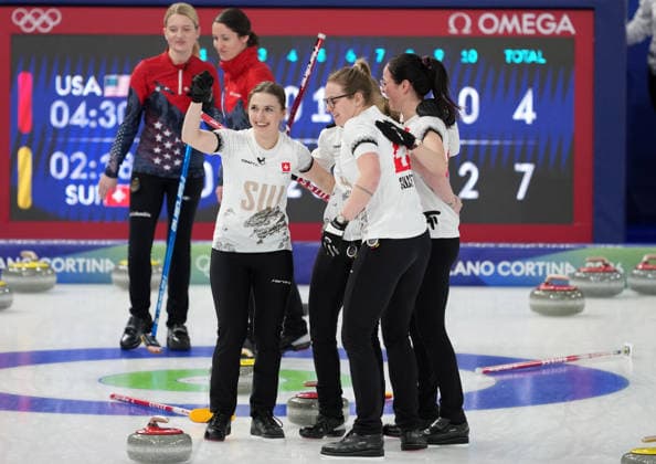 (260220) -- CORTINA D AMPEZZO, Feb. 20, 2026 -- Players of Switzerland celebrate after the curling women s semifinal match between the United States and Switzerland at the 2026 Milan-Cortina Winter Olympics in Cortina, Italy, Feb. 20, 2026. ) (MICO2026)ITALY-CORTINA D AMPEZZO-OLYMPIC Winter games, Winterspiele,Spiele, Summer games CURLING-WOMEN-SEMIFINAL-USA VS SUI LixGang 