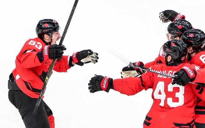 ITALY, MILAN - FEBRUARY 20, 2026: Canada s players celebrate a goal in a menâ€™s Ice hockey, Eishockey play-off semifinal match between Canada and Finland at the Milano Santagiulia Ice Hockey Arena, as part of the 2026 Winter Olympic Games, Olympische Spiele, Olympia, OS Peter Kovalev TASS  89004997