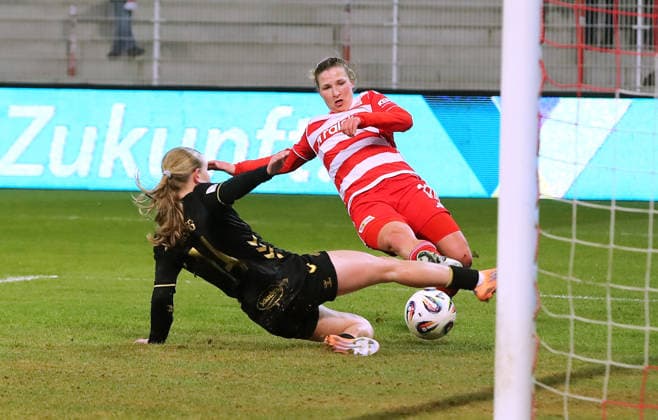 Dina Orschmann scores the goal for 1 0 against Carlotta Imping duel Match scene Action Sport Football Soccer Bundesliga Women Season 2025 2026 20 02 2026 1 FC Union Berlin vs 1 FC Köln DFL regulations prohibit any use of photographs as image sequences and or quasi video